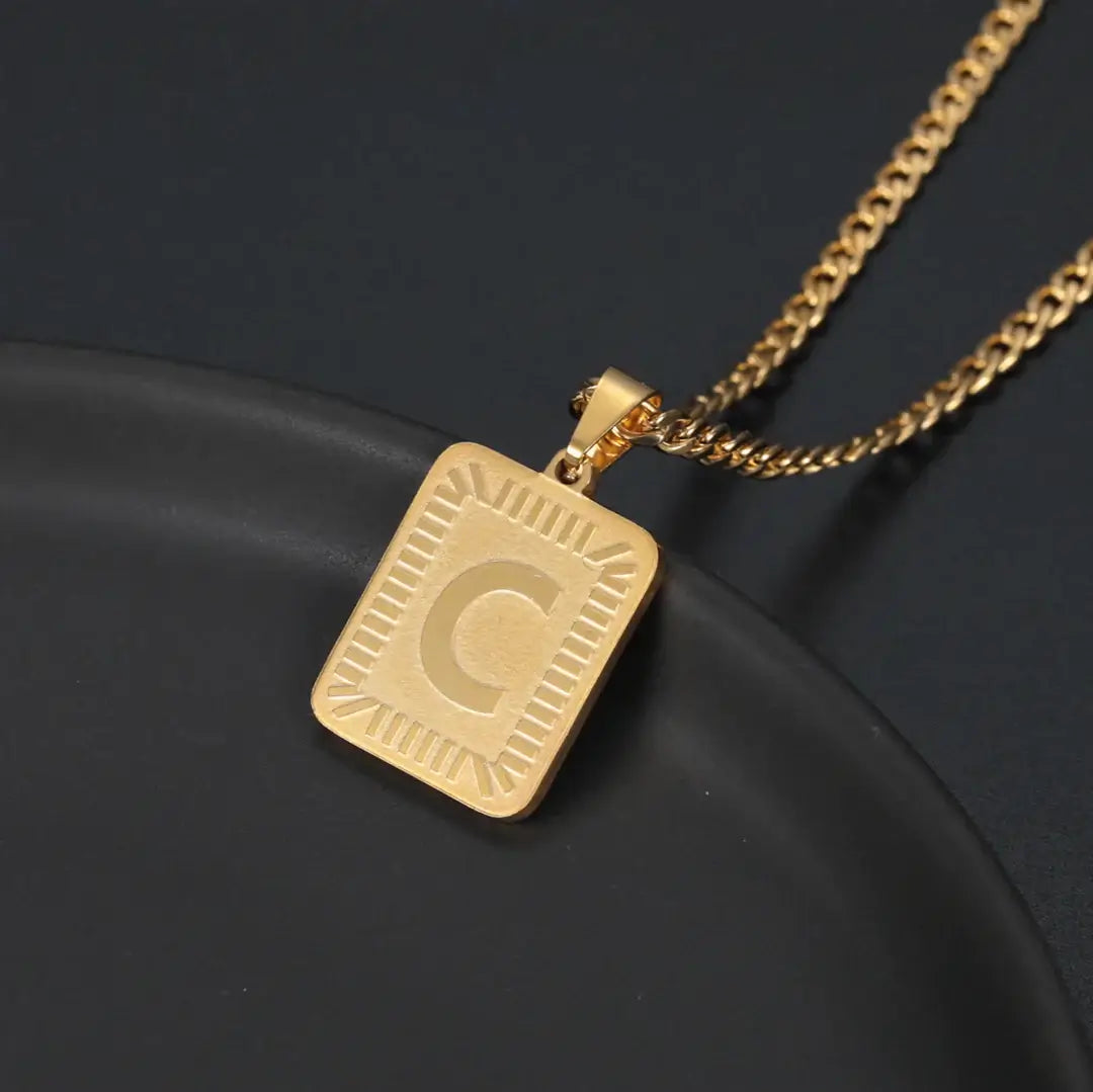 Embossed Initial Necklace with Cuban Chain by AUREATE, featuring a 3D embossed 'C' initial on a luxurious chain.