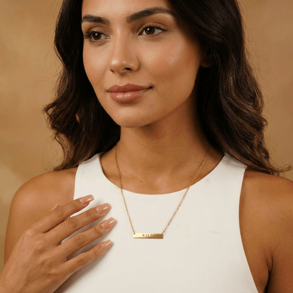 Bar Necklace with Engraving worn by a model, showcasing a personalised sleek design by AUREATE.