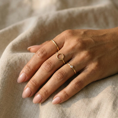 AUREATE warm gold ring stack editorial