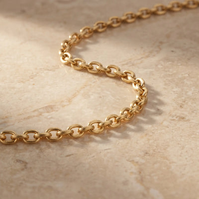 AUREATE warm gold cable chain editorial macro