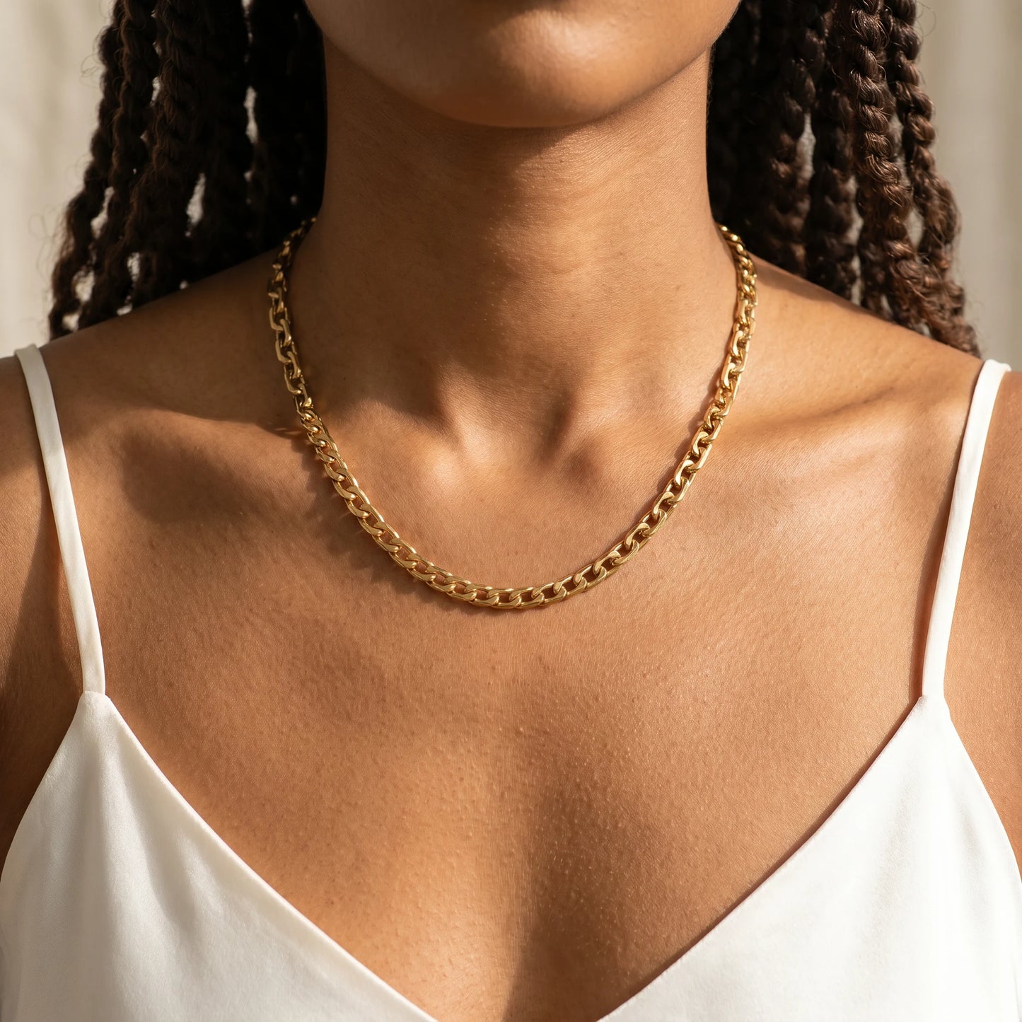 Bold curb chain necklace gold worn close-up dainty 6.5mm flat-link