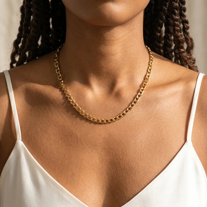 Bold curb chain necklace gold worn close-up dainty 6.5mm flat-link