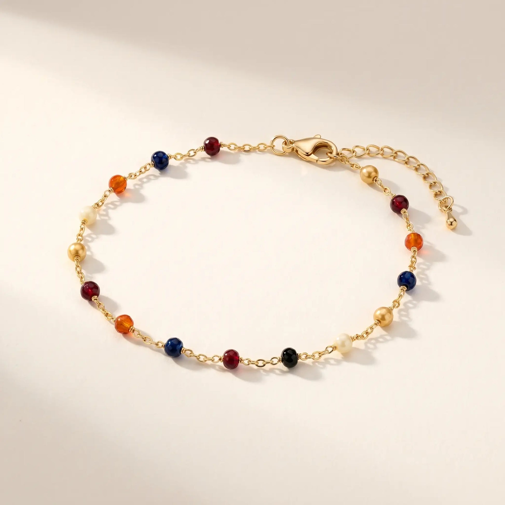 Multicolor bead anklet 18K gold cable chain packshot on cream background