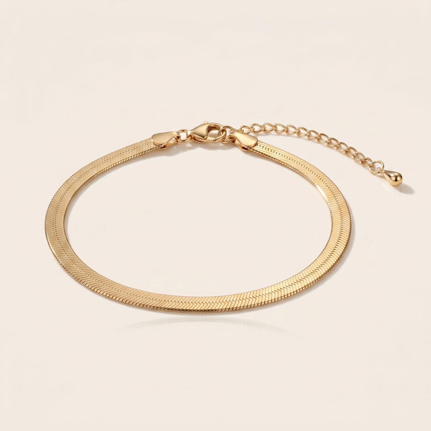 Gold herringbone flat chain anklet packshot off-white studio