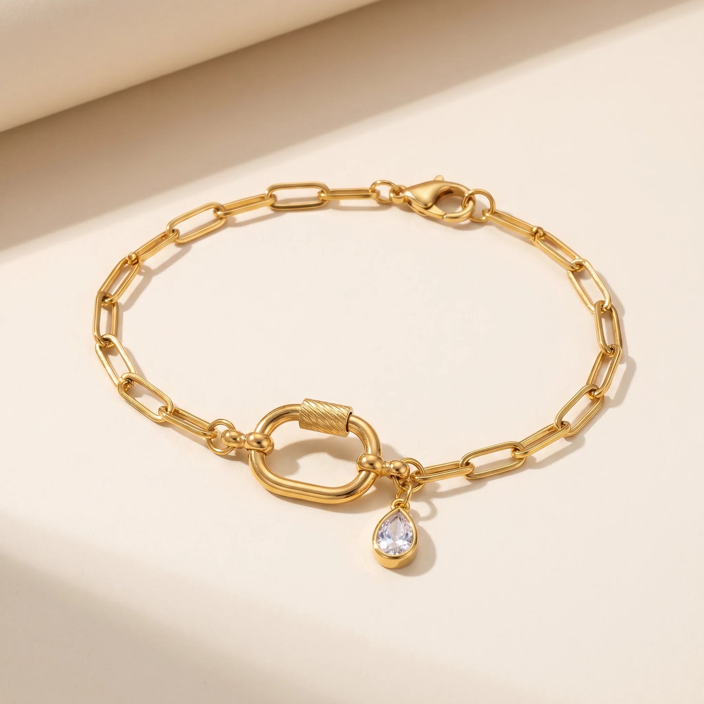 Gold carabiner paperclip anklet packshot 18K gold plated waterproof oval carabiner teardrop CZ