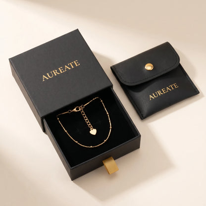 AUREATE matte black gift box gold logo gold ribbon tab leather pouch satellite beaded gold anklet inside