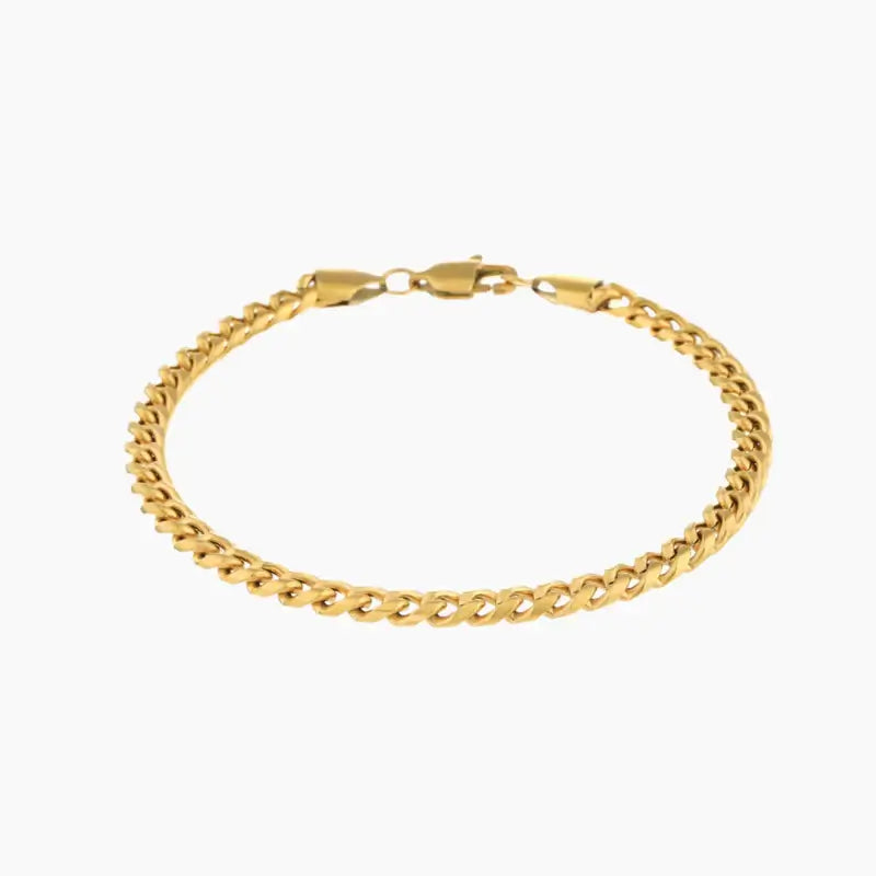 5mm Cuban Link Bracelet by AUREATE, a stylish golden chain for unisex everyday wear.