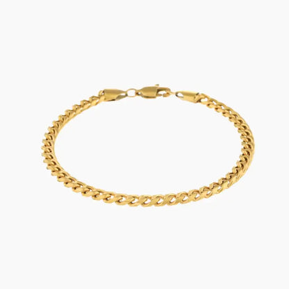 5mm Cuban Link Bracelet by AUREATE, a stylish golden chain for unisex everyday wear.