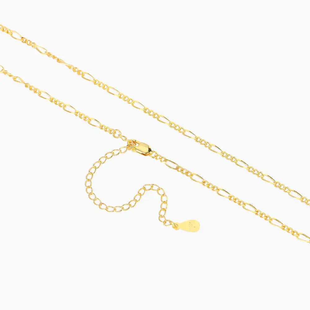 3mm Figaro Chain Necklace by AUREATE featuring an elegant alternating link design in gold.