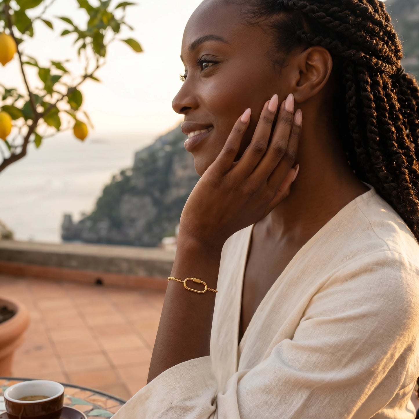 Dainty gold cable bracelet — Amalfi terrace profile shot
