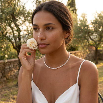 Pearl necklace Tuscan garden lifestyle white silk blouse golden hour