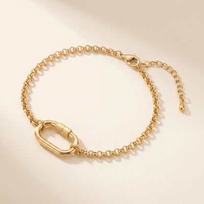 Gold rolo charm bracelet with oval carabiner lock pendant - packshot 18K gold plated with 3cm cable extender