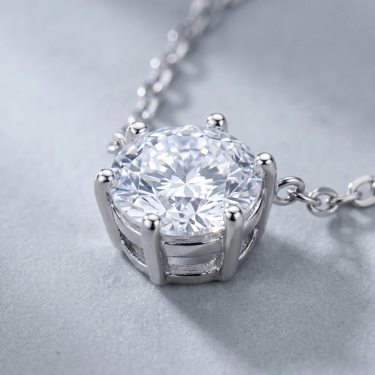 Floating Solitaire Necklace Silver Tone - macro showing 6-prong basket and brilliant cut CZ