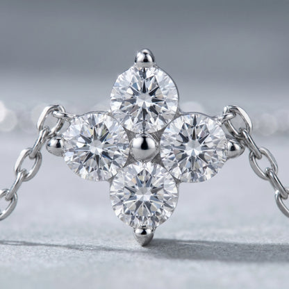 Diamond cluster necklace silver macro detail 4 brilliant CZ stones 3-prong