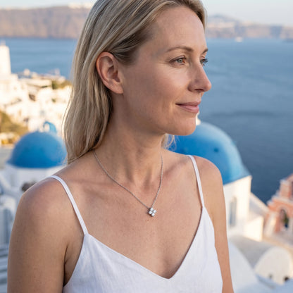 Diamond cluster necklace silver Santorini profile aspirational golden hour
