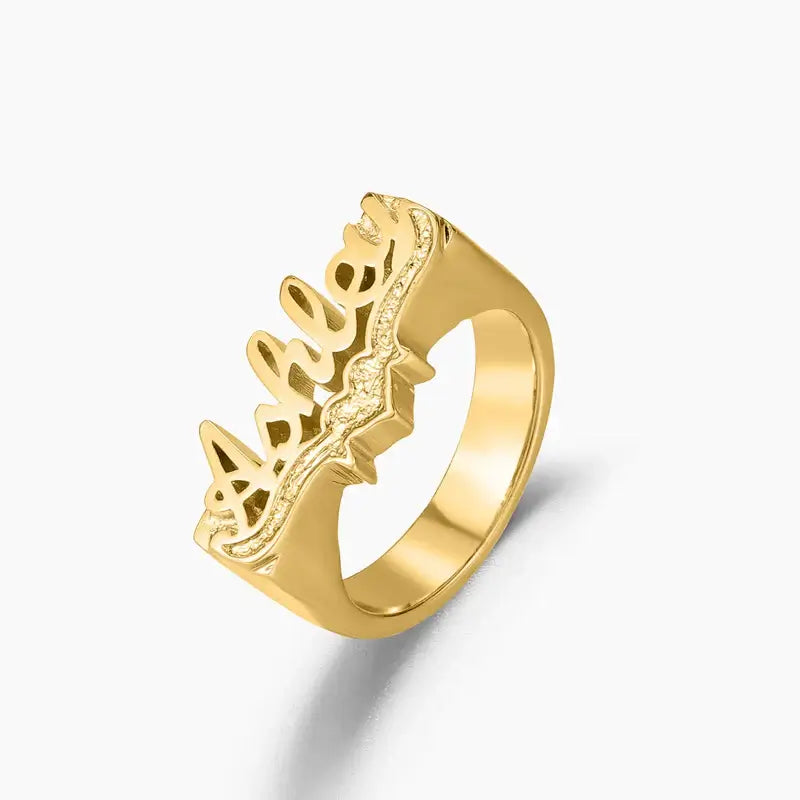 3D Personalised Name Ring by AUREATE featuring a golden design with the name Ashley elegantly displayed.