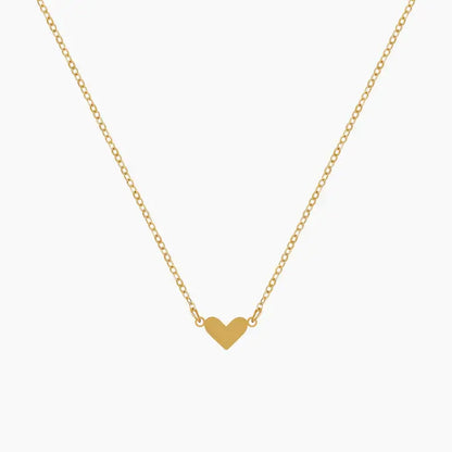 Classic Heart Pendant Necklace by AUREATE, a dainty gold necklace featuring a minimalist heart pendant.