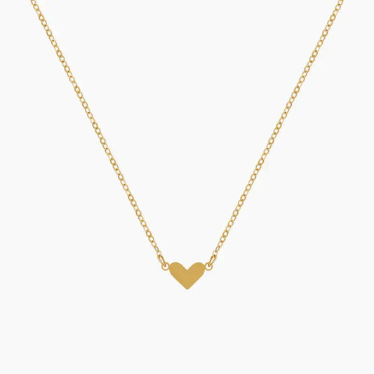 Classic Heart Pendant Necklace by AUREATE, a dainty gold necklace featuring a minimalist heart pendant.