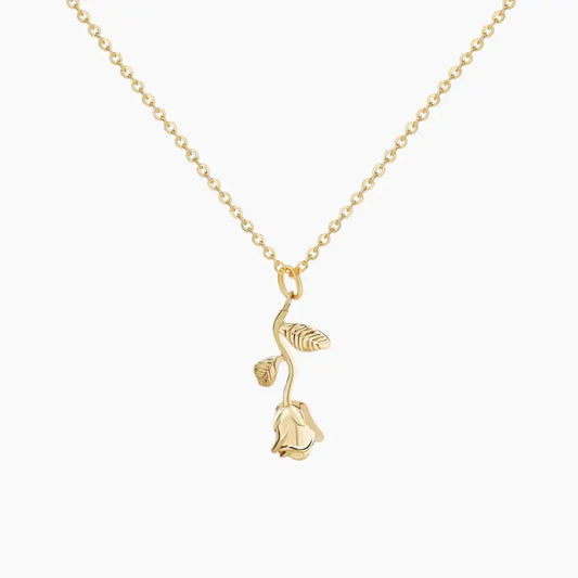 AUREATE Rose Charm Necklace featuring a detailed gold rose pendant on a delicate chain.