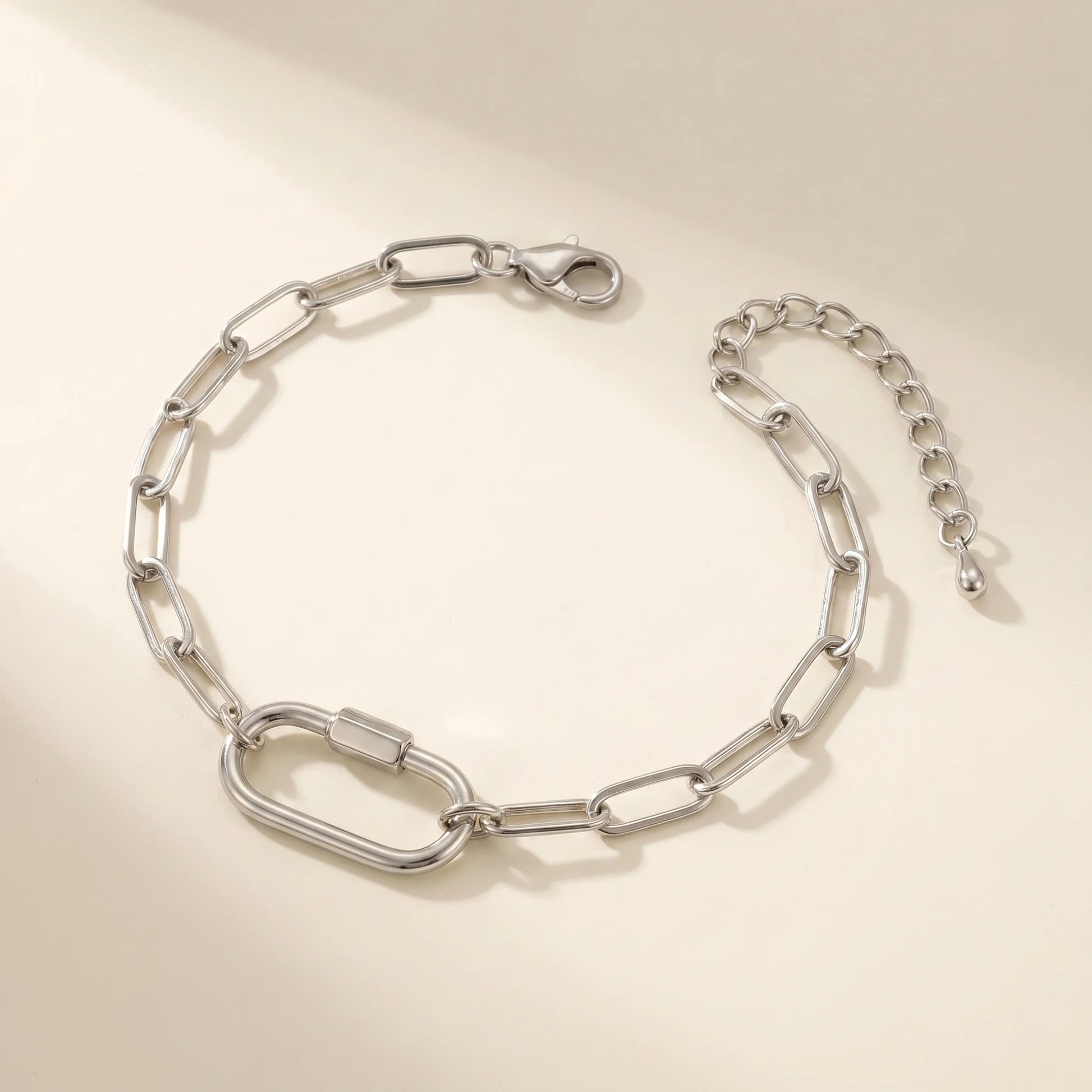 Silver paperclip bracelet with oval lock pendant - packshot stainless steel with 3cm cable extender chain