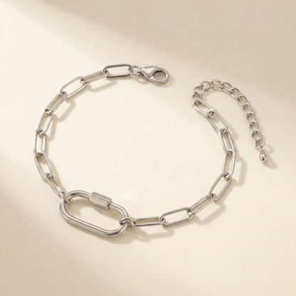 Silver paperclip bracelet with oval lock pendant - packshot stainless steel with 3cm cable extender chain