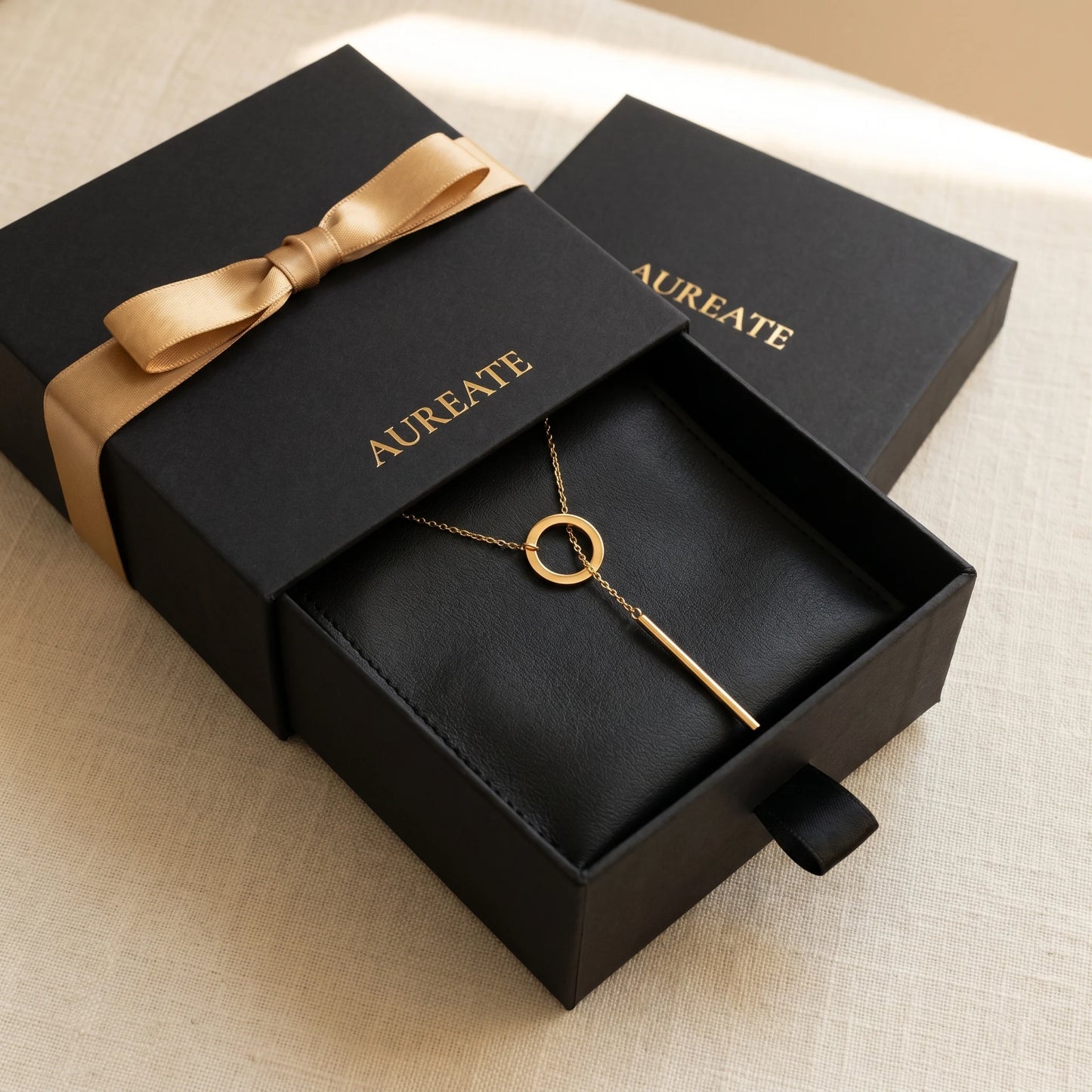AUREATE gift box black slide drawer with gold Y-lariat slip-through necklace