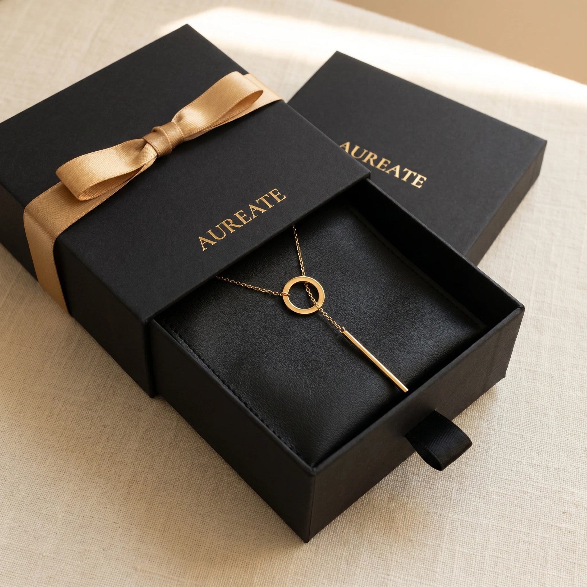 AUREATE gift box black slide drawer with gold Y-lariat slip-through necklace