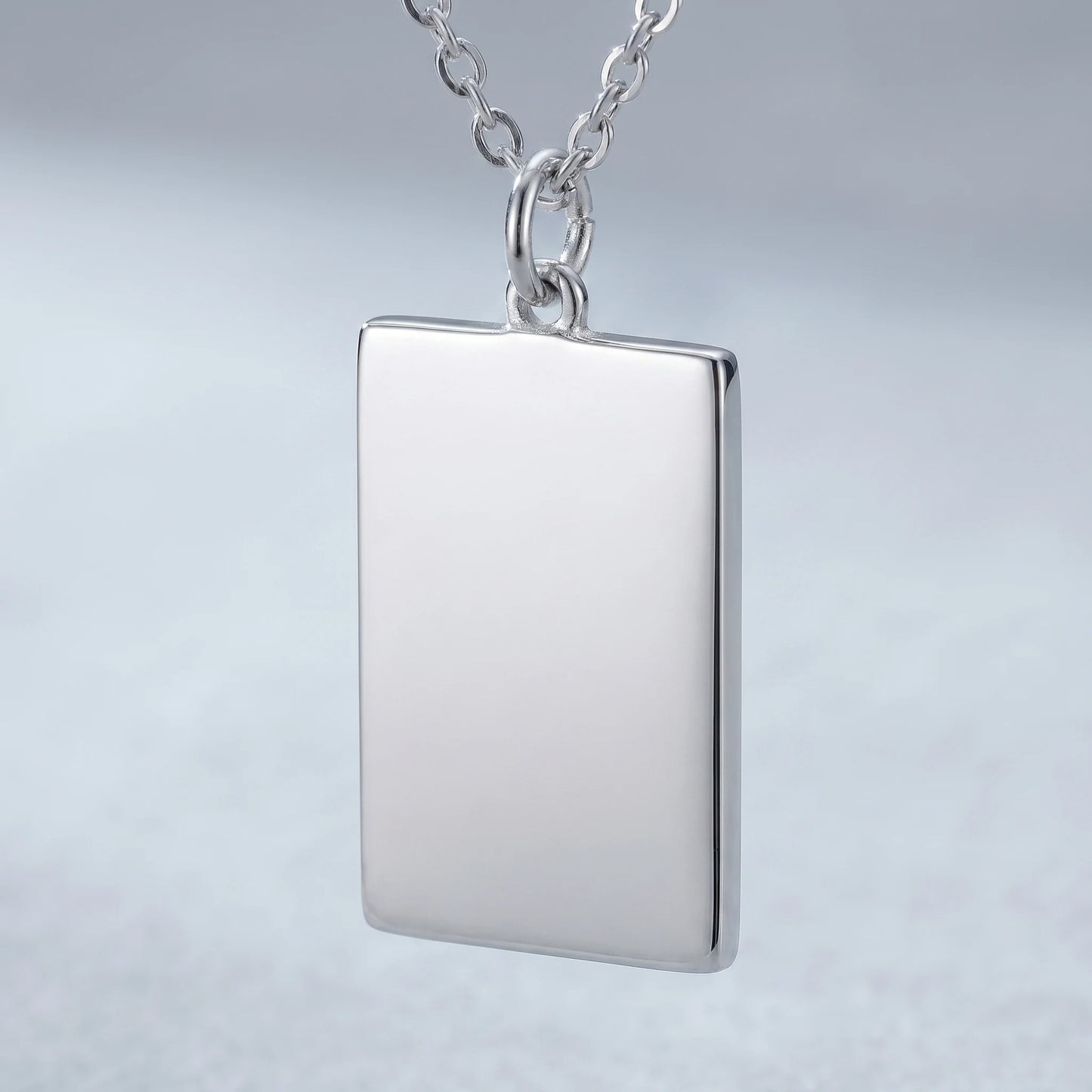 Silver rectangle pendant macro detail polished blank front sharp orthogonal corners