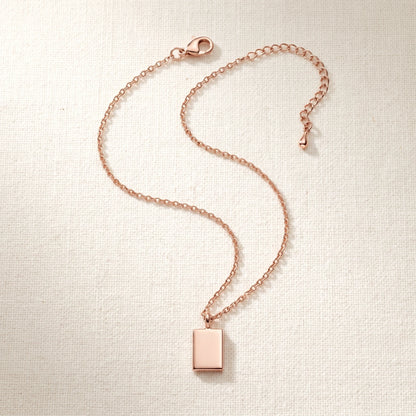 Rose gold rectangle pendant necklace packshot S-curve sharp corners chain connected