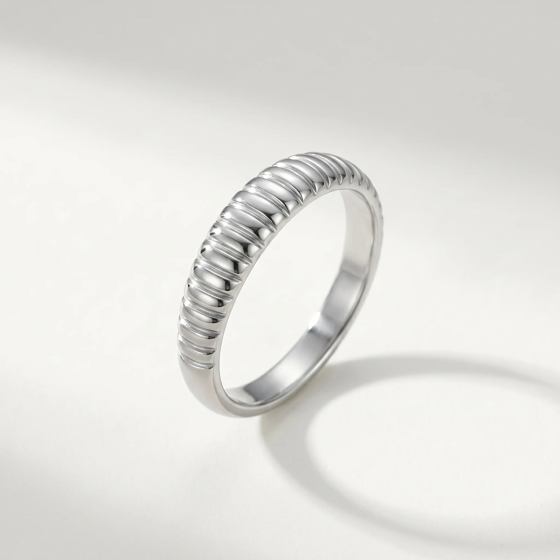 Dainty croissant dome ring silver packshot cool ivory background