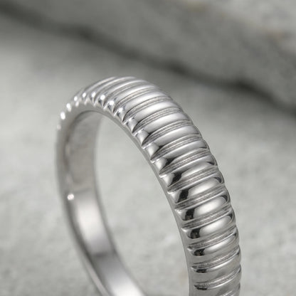 Dainty croissant dome ring silver macro fine ribbed grooves detail