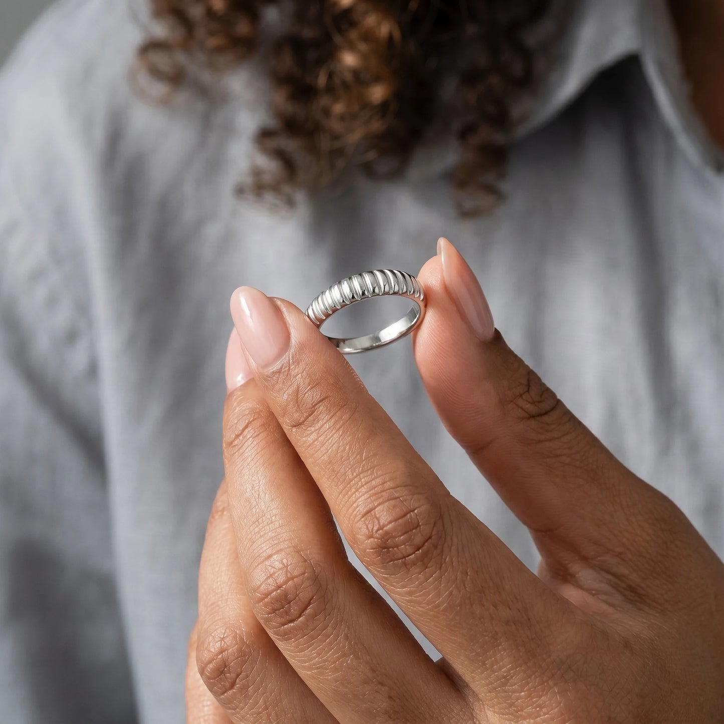 Dainty croissant dome ring silver hand-held vertical
