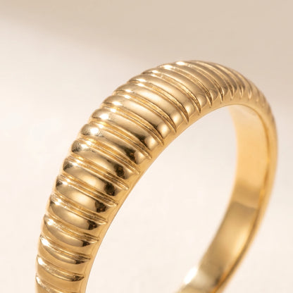 Dainty croissant dome ring gold macro fine ribbed grooves detail