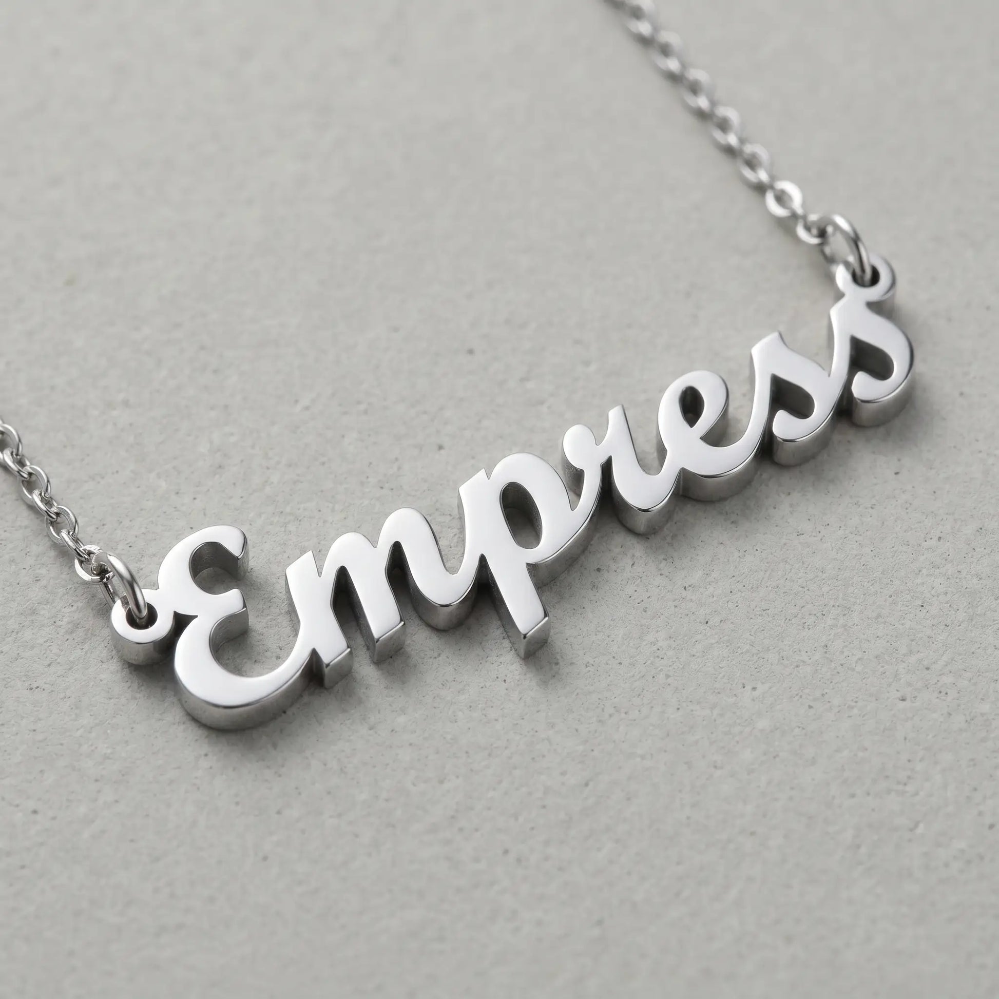 Personalised Plate Chain in 18K Gold by AUREATE featuring a silver nameplate 'Empress'