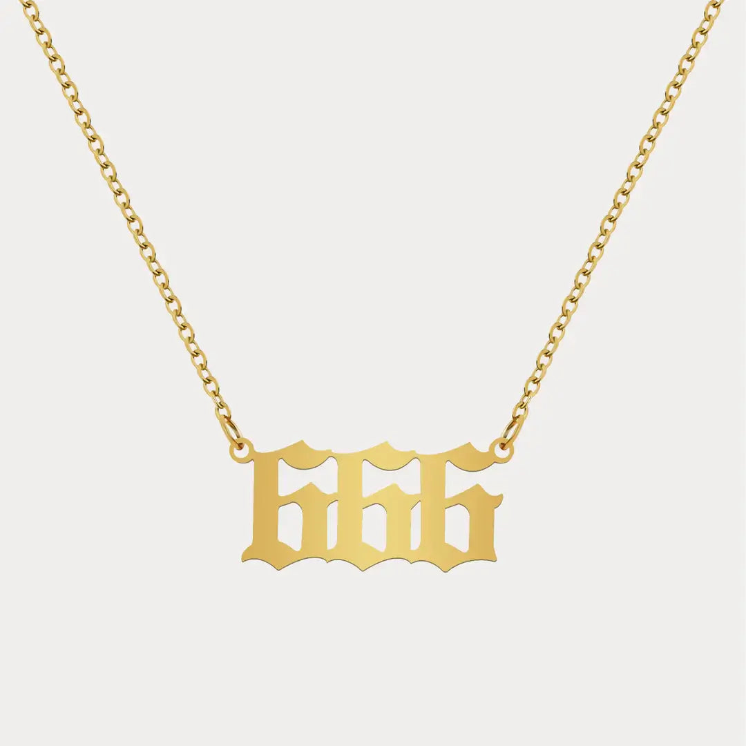 Angel Number Pendant Necklace by AUREATE featuring a gold chain with 666 symbol, perfect for spiritual jewelry.