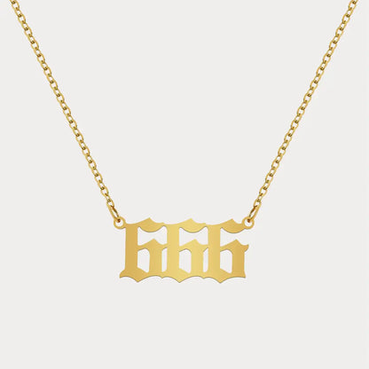 Angel Number Pendant Necklace by AUREATE featuring a gold chain with 666 symbol, perfect for spiritual jewelry.