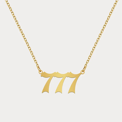 Angel Number Pendant Necklace by AUREATE featuring a gold 777 design for spiritual guidance.