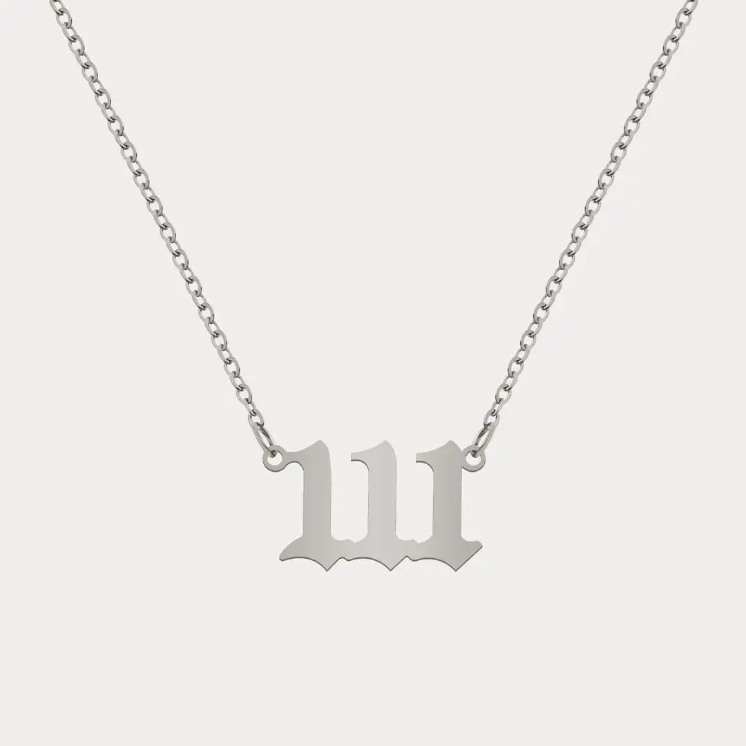 Angel Number Pendant Necklace by AUREATE, featuring a stylish silver design with a unique number charm.