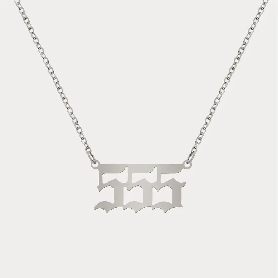 Angel Number Pendant Necklace by AUREATE, featuring a minimalist silver design for daily spiritual wear.