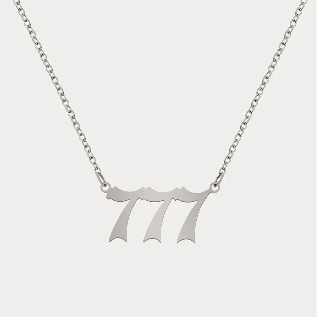 Angel Number Pendant Necklace by AUREATE featuring a sleek silver design with the number 777, perfect for daily wear.
