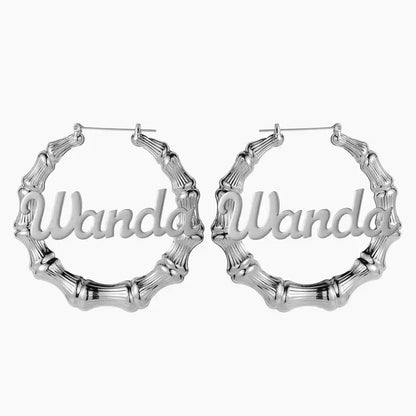 Name Bamboo Hoop Earrings by AUREATE in silver featuring personalized name design.