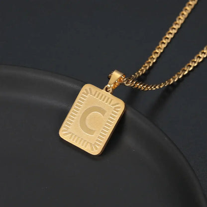 Embossed Initial Necklace with Cuban Chain by AUREATE, featuring a 3D embossed 'C' initial on a luxurious chain.