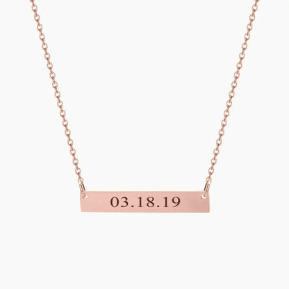 AUREATE Bar Necklace with Engraving featuring a personalized date on a sleek rose gold design.