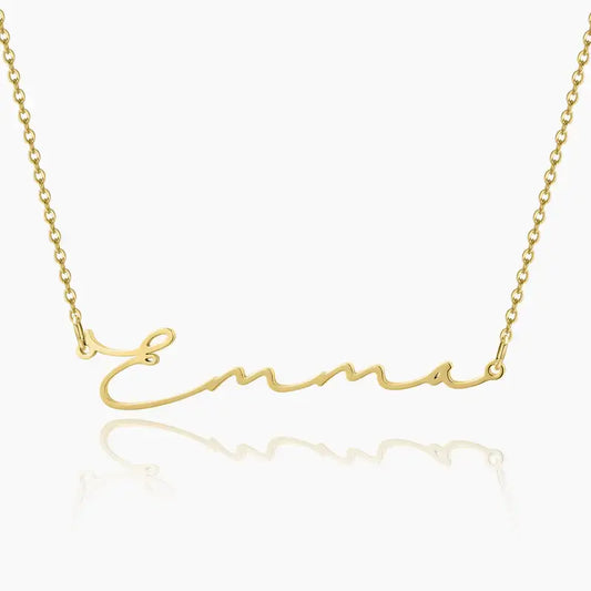 Aureate Petit Name Necklace in gold with personalized name 'Emma', sleek and elegant design for minimalist style.