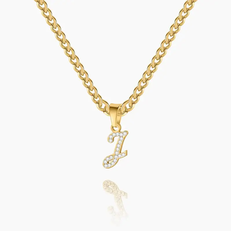 Iced Script Letter Necklace by AUREATE featuring a gold chain with a sparkling crystal initial pendant.