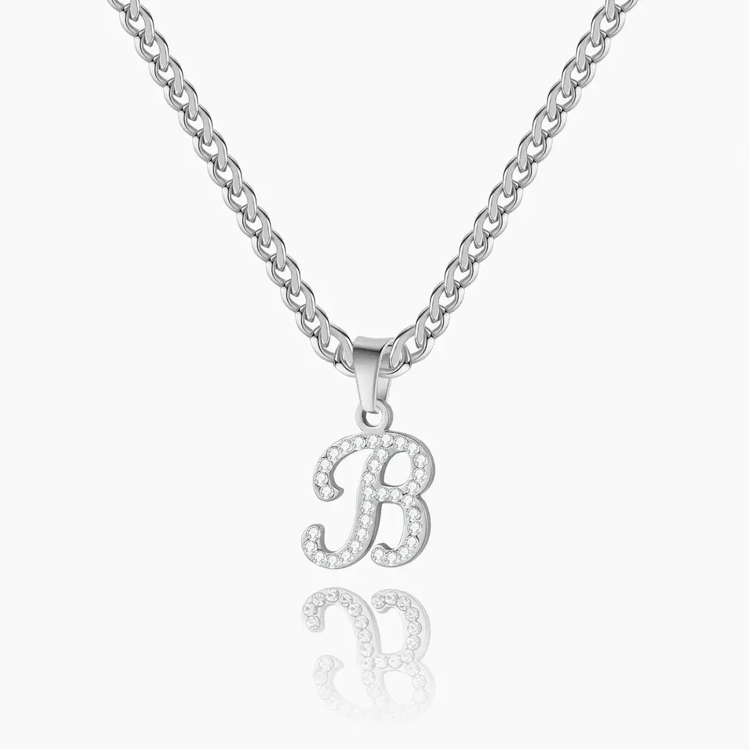 AUREATE Iced Script Letter Necklace featuring a sparkling 'B' initial pendant on a silver chain.