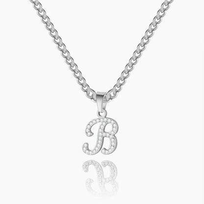 AUREATE Iced Script Letter Necklace featuring a sparkling 'B' initial pendant on a silver chain.