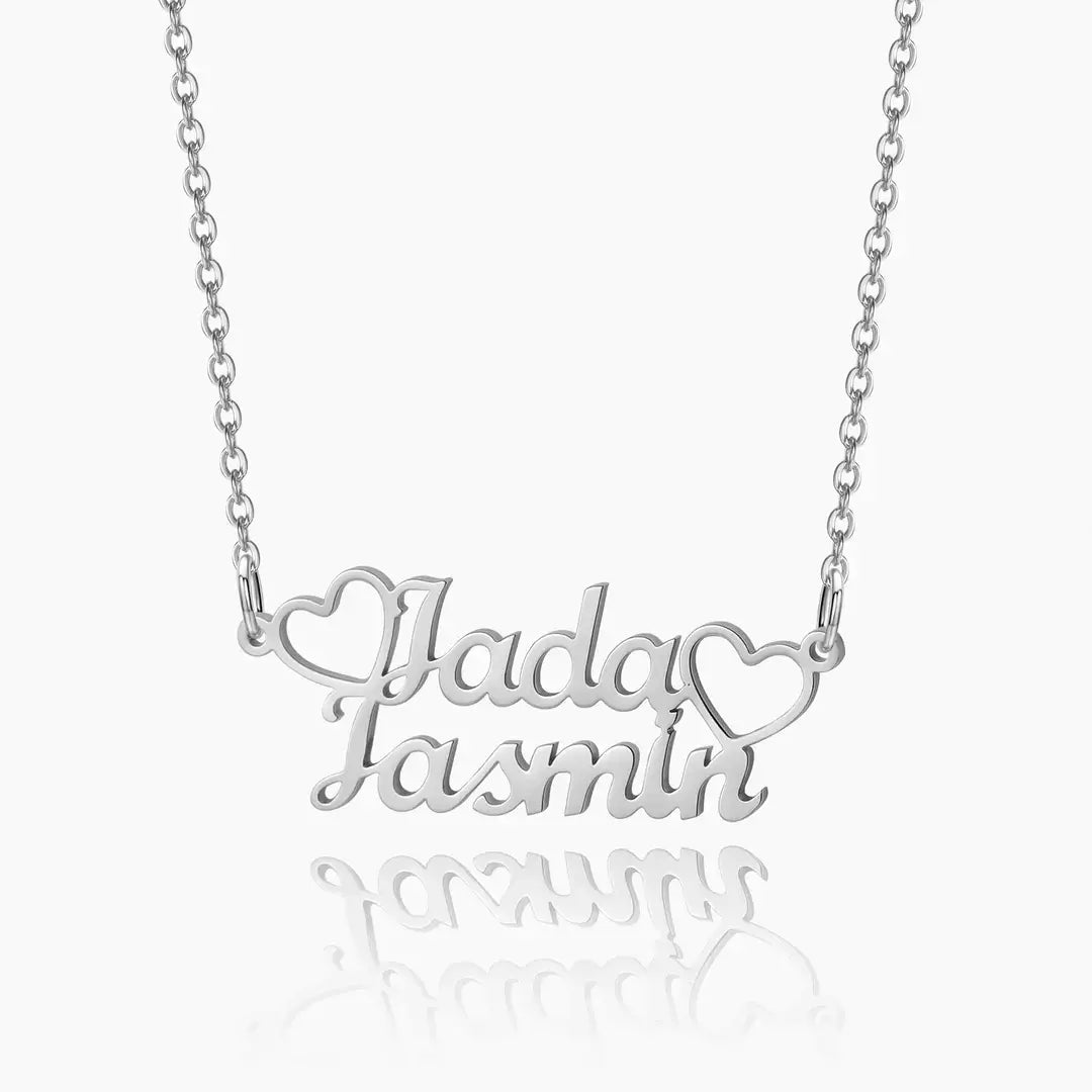AUREATE Two Name Necklace featuring names Jada and Jasmin in silver with heart accents.