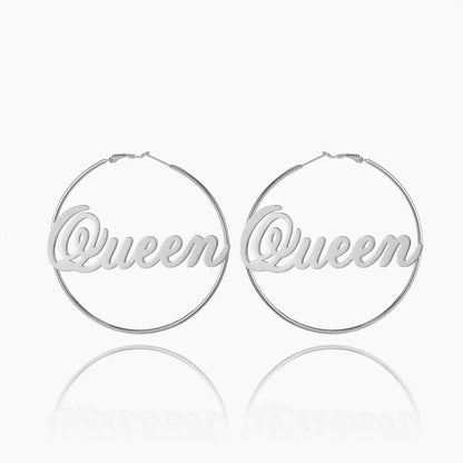 Script Name Hoop Earrings by AUREATE featuring a cursive 'Queen' in silver, perfect for personalized statement jewelry.