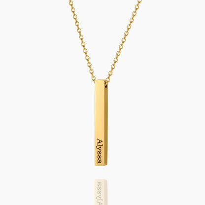 3D Bar Engraved Necklace by AUREATE featuring a gold bar pendant with the name Alyssa